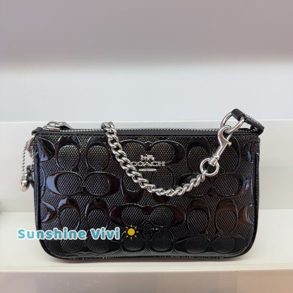 Coach Handbags - NWT Coach Nolita 19 In Signature Leather With Heart Charm CCZ27 Silver Black
